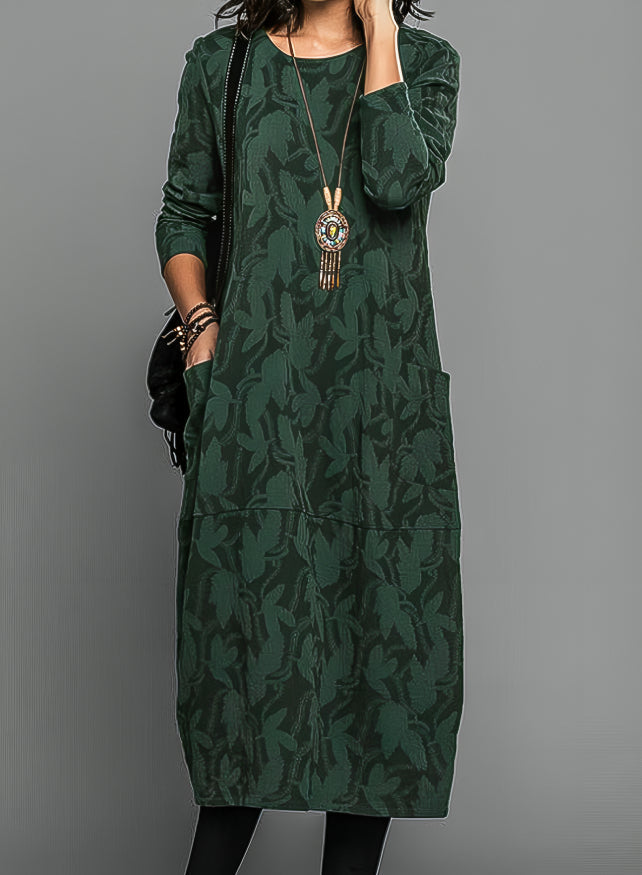 Robe d'hiver élégante Betty de Danoir Paris, couleur verte, coupe courte, portée par un mannequin.
