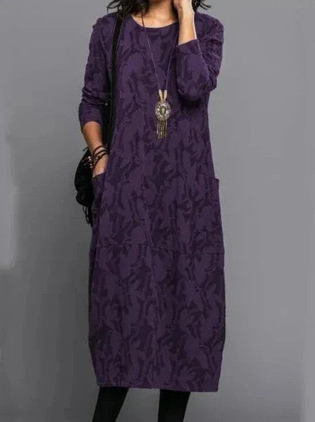 Robe d'hiver élégante Betty de Danoir Paris, en vert, avec coupe sophistiquée et détails tendance pour l'hiver.