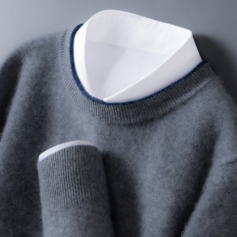 Pull en cachemire élégant Bennett de Danoir Paris, coloris gris foncé, avec col rond et finition soignée.