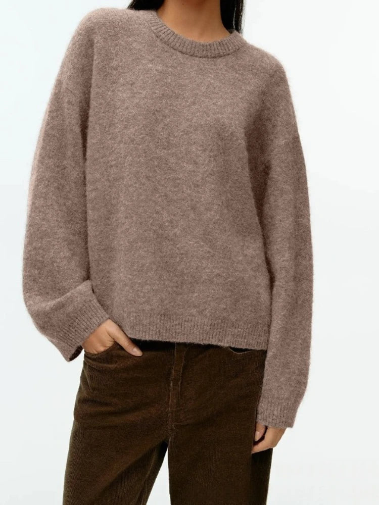 Pull en cachemire vert Liora de Danoir Paris, élégant et confortable, avec un design raffiné et une texture douce visible sur l'image.
