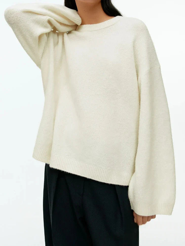 Pull en cachemire vert Danoir Paris Liora, élégant et doux, avec un col rond et une coupe sophistiquée.