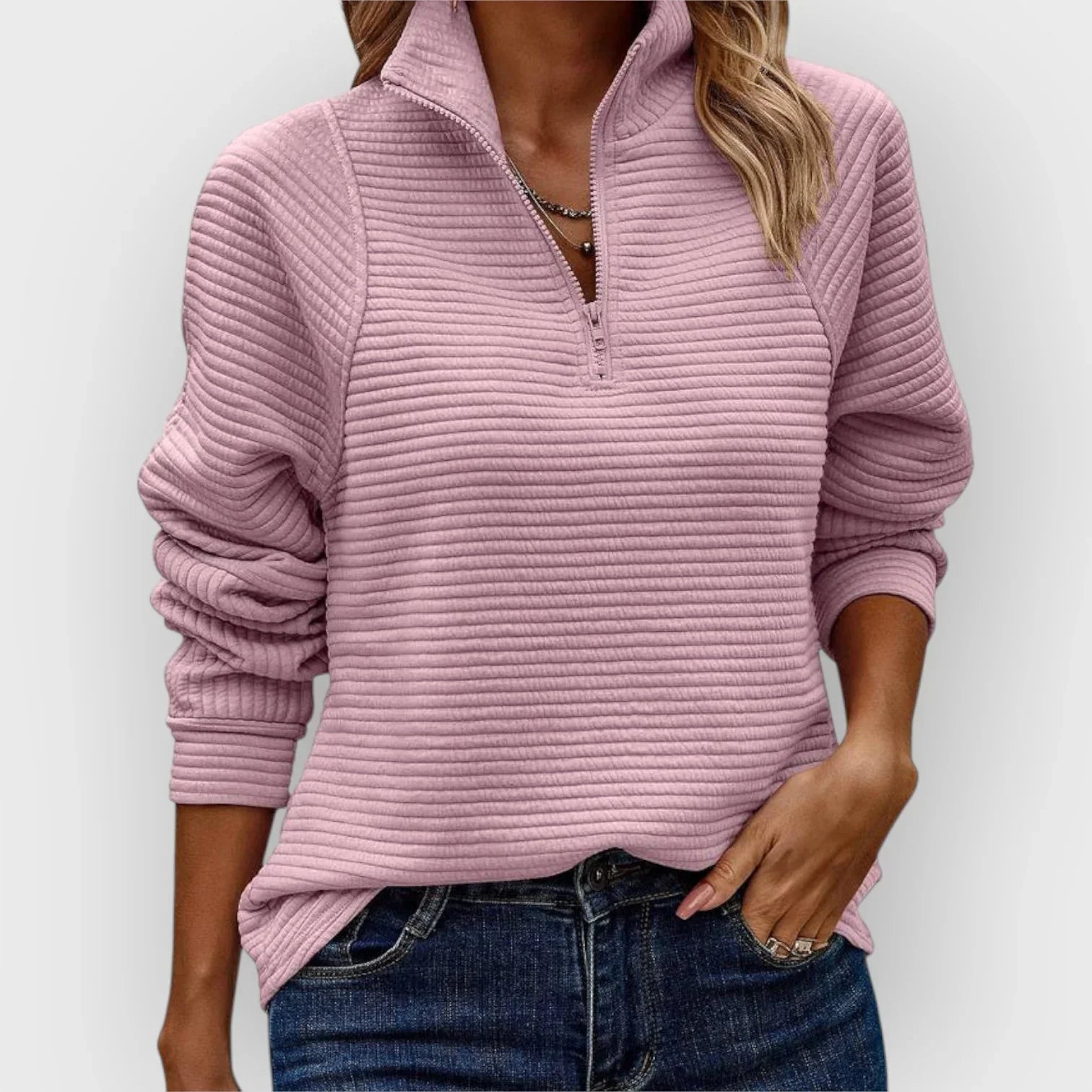 Pull chic et confortable Olivia de Danoir Paris en rose, tissu doux et style élégant pour un look tendance.