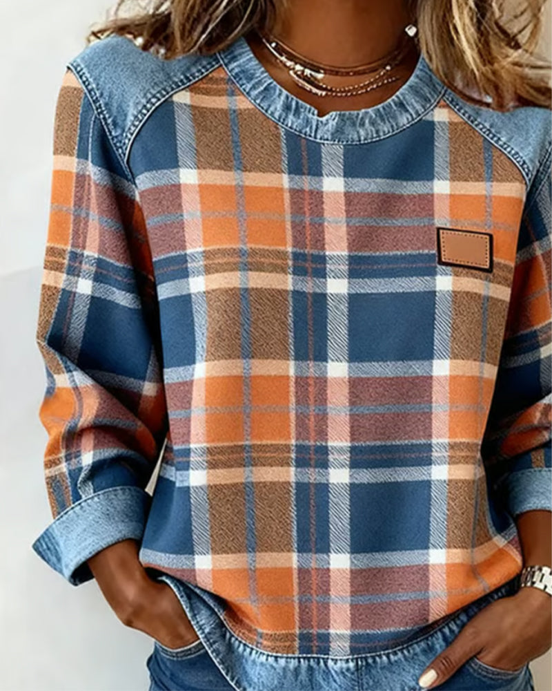 Sweatshirt patchwork audacieux Célia de Danoir Paris en orange avec motifs colorés, tissu confortable et style tendance.