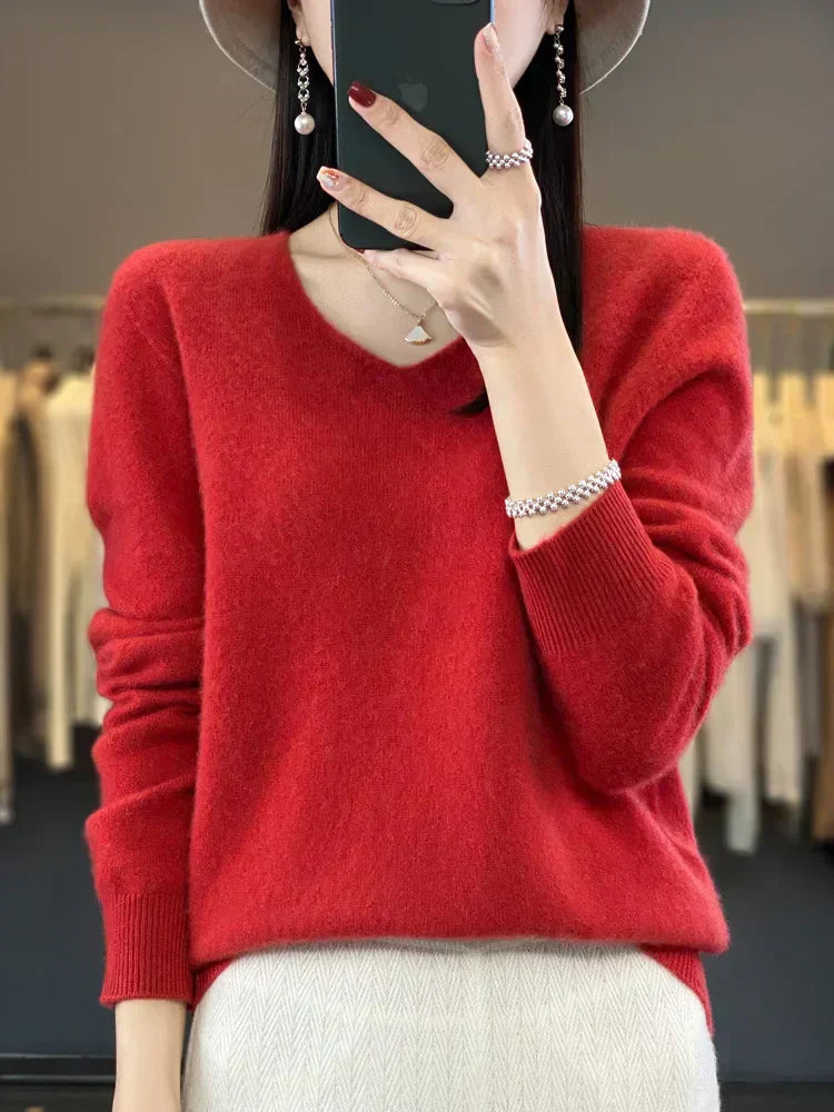 Pull ample en laine vert Adèle de Danoir Paris, coupe décontractée, col rond, tissu doux et chaud visible sur l'image.