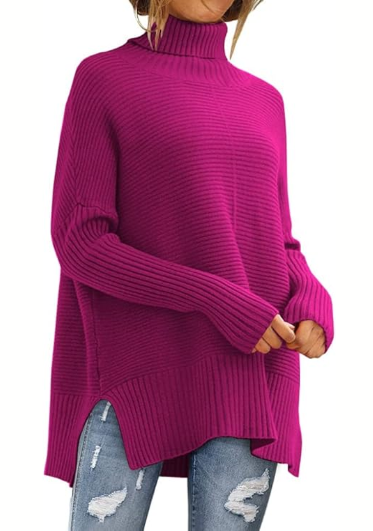 Pull roulé Danoir Paris Anna en bleu marine, confection confortable automnal, proche du corps, tissu doux et chaud.