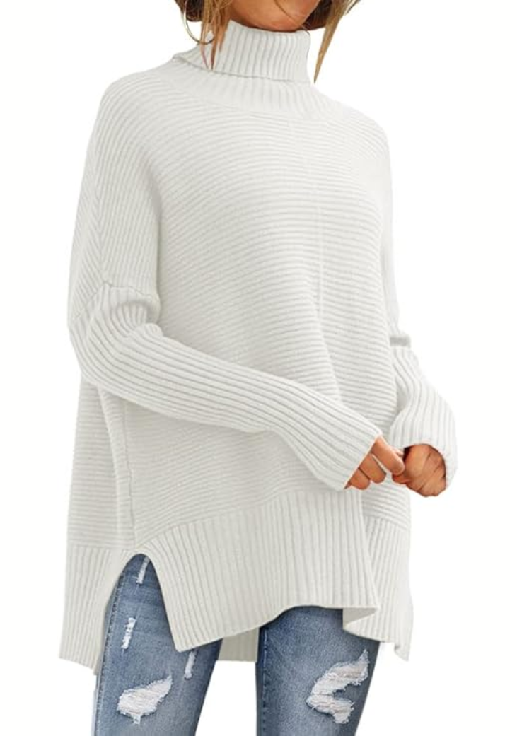Pull roulé Danoir Paris Anna, confortable automnal en bleu marine, jersey doux et ajusté, porté sur mannequin.