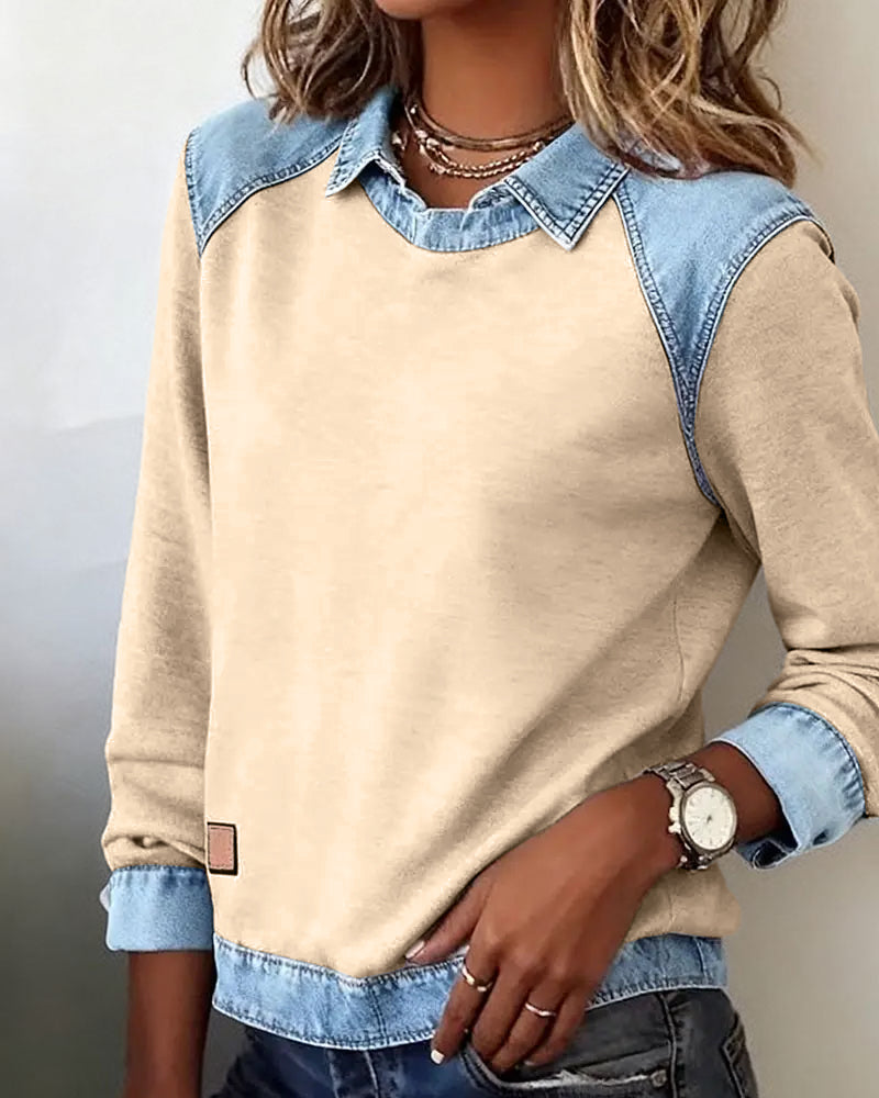 Blouse moderne beige Lina de Danoir Paris avec broderie élégante, vue de face sur mannequin.
