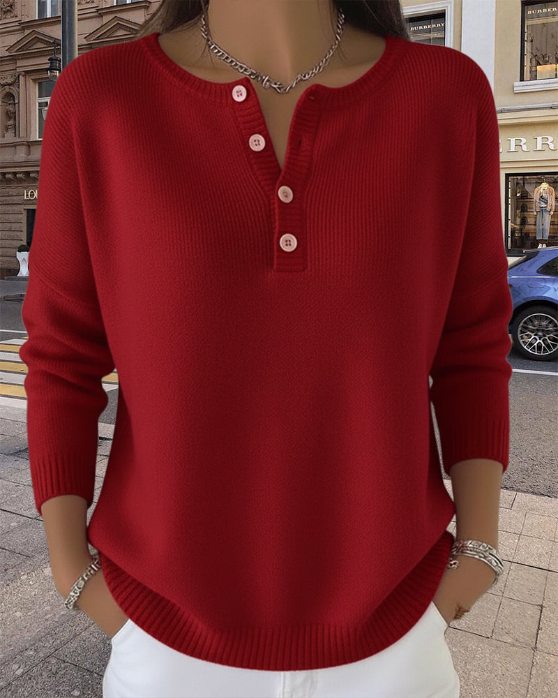 Gilet basique rouge à manches longues Lena de Danoir Paris, porté sur un mannequin dans une image montrant le vêtement.