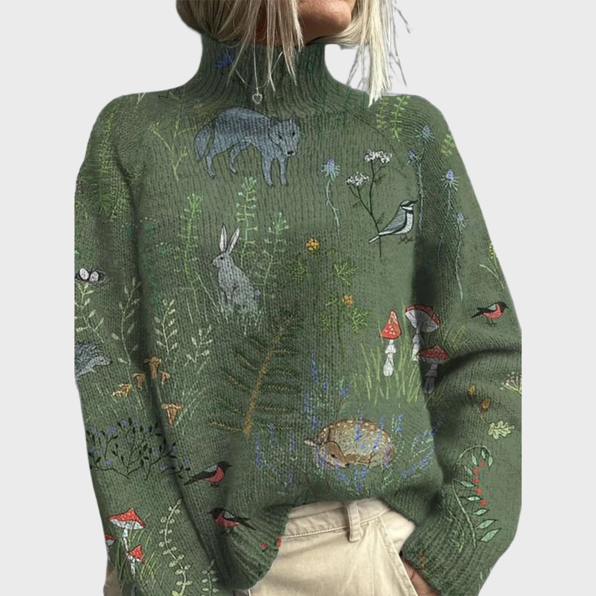Pull tricoté artistique HANA de Danoir Paris, en laine douce, porté en mode décontracté, avec détails de tricot coloré.