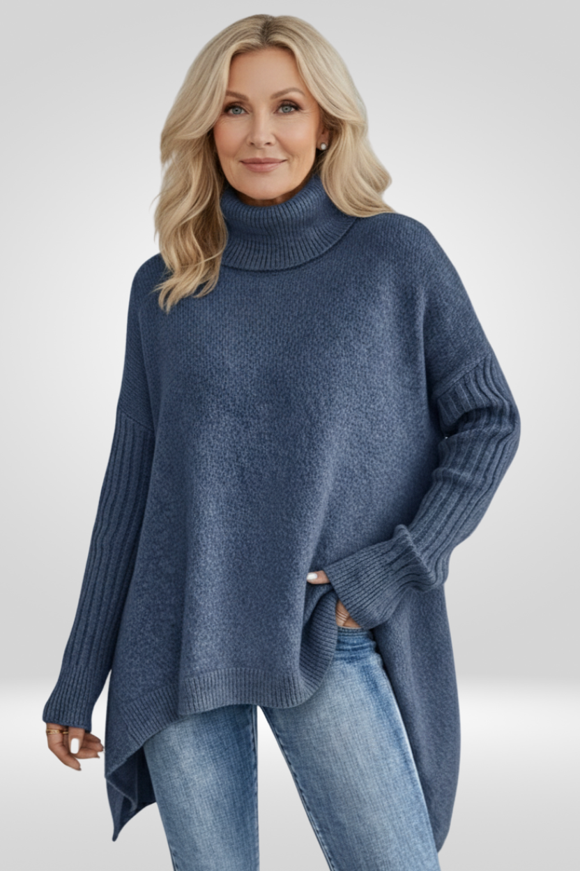 Pull asymétrique beige Danoir Paris Isabelle, style chic, avec coupe moderne et détails élégants, pour un look sophistiqué.