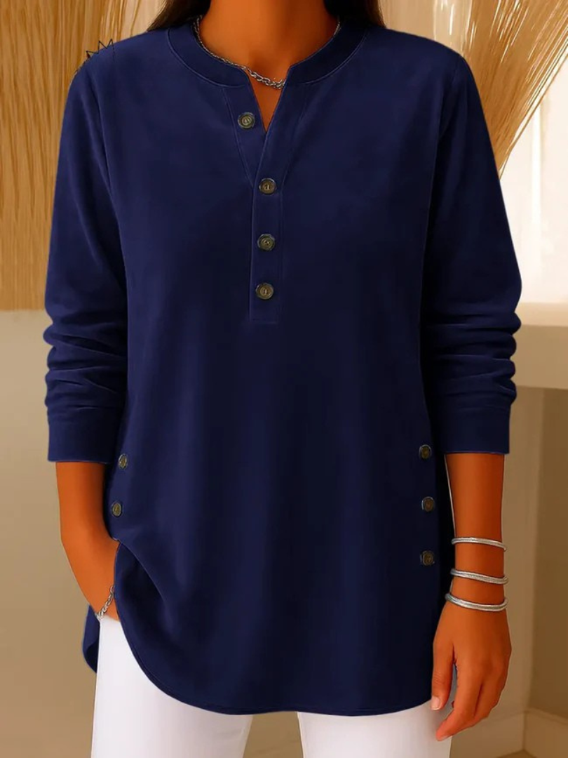 Pull classique Danoir Paris Meredith en bleu, style élégant et intemporel, avec un col rond et finition soignée.