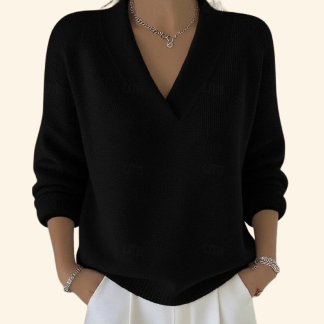 Pull Noor Danoir Paris en rouge, style confortable et élégante, avec détails modernes, porté en vue de face.
