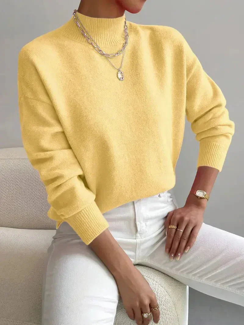 Pull rose clair Noëlle de Danoir Paris, chic et doux, en tissu confortable avec col rond et manches longues.