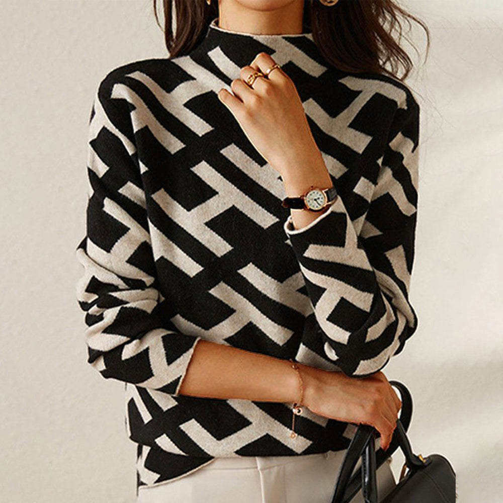 Pull roulé luxueux Jessy de Danoir Paris, en tissu élégant, porté sur mannequin, détails de finition raffinés, style moderne.