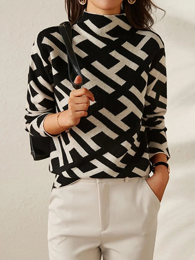 Pull roulé luxueux Jessy de Danoir Paris, vêtement en tissu doux et élégant, porté sur mannequin.