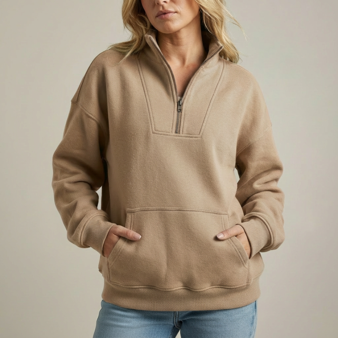 Pull douillet chic Talbot de Danoir Paris en tissu sarcelle, avec design élégant et confort douillet.