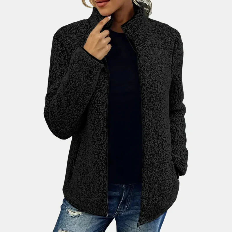 Veste chic en sherpa Danoir Paris Xara, coupe élégante, bleu, pour femme, doublure douce et tendance.