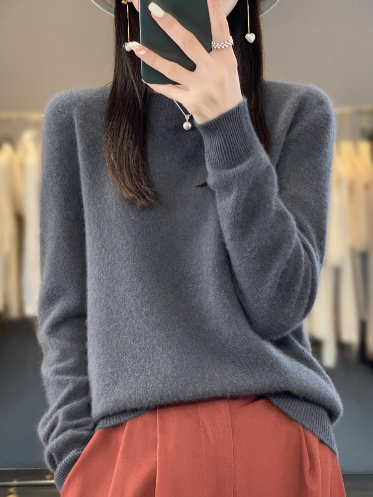 Pull chaud en cachemire Anette de Danoir Paris, couleur turquoise, vu en taille 2XS, détail du tissu et style élégant.
