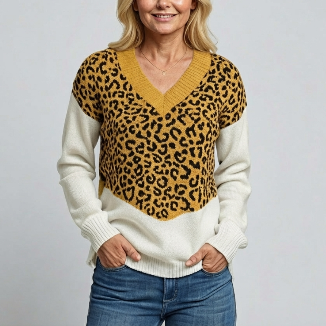 Pull Isa Danoir Paris en laine gris à motif léopard chic, coupe ajustée et détails tendance.