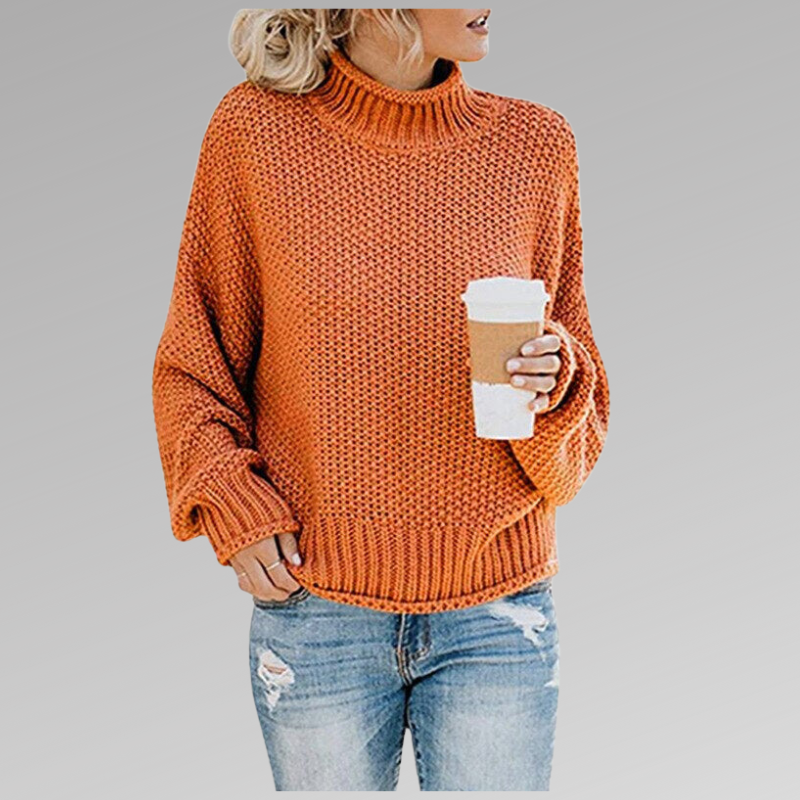 Pull Helena Danoir Paris couleur orange, élégant motif printanier, style féminin et tendance, vue de face.