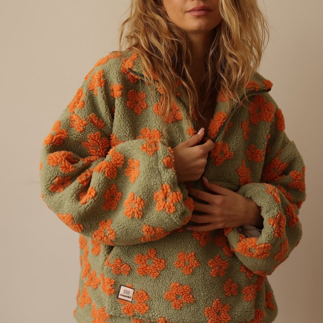 Pull oversize floral doux Maisy de Danoir Paris, pull jaune avec motif floral, confortable et tendance.