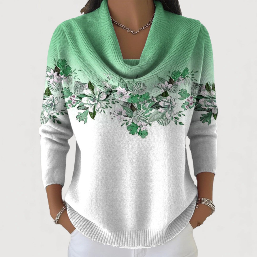 Pull floral élégant Danoir Paris Alora FR1354 en camel, détail de motifs floraux et coupe sophistiquée visible sur l'image.