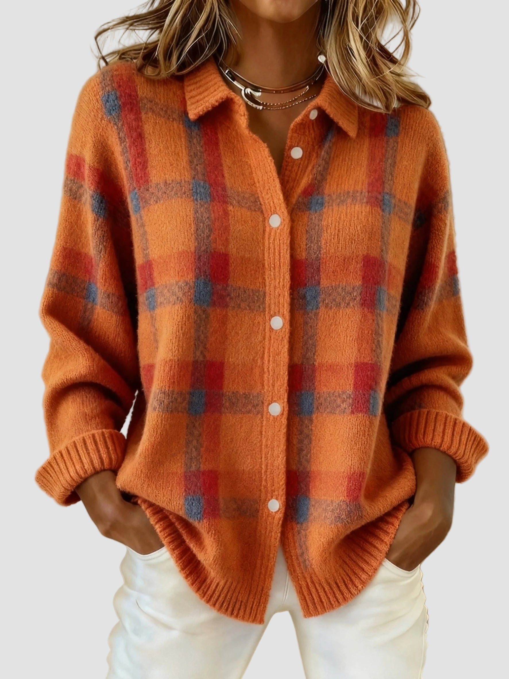 Pull douillet à carreaux Amelia de Danoir Paris en orange, doux et chaud, idéal pour l'hiver.