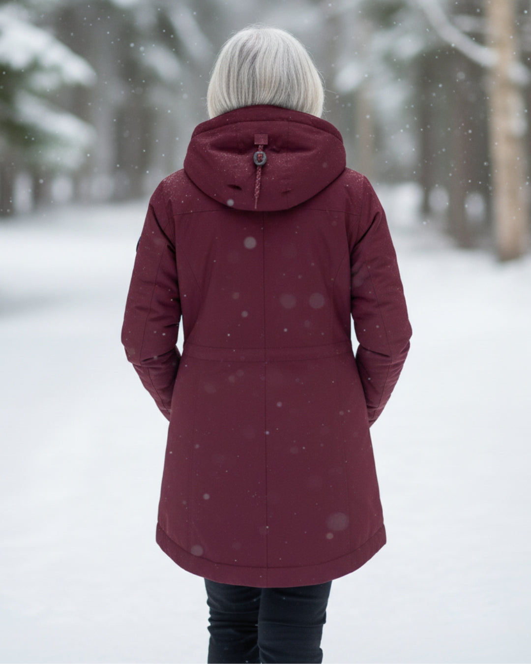 Parka réversible élégante Amelia de Danoir Paris en rouge, coupe sophistiquée, idéale pour un style chic et pratique.