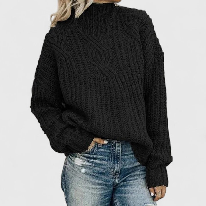 Pull torsadé vert Danoir Paris Lerynna, style élégant, en maille fine, porté sur mannequin.