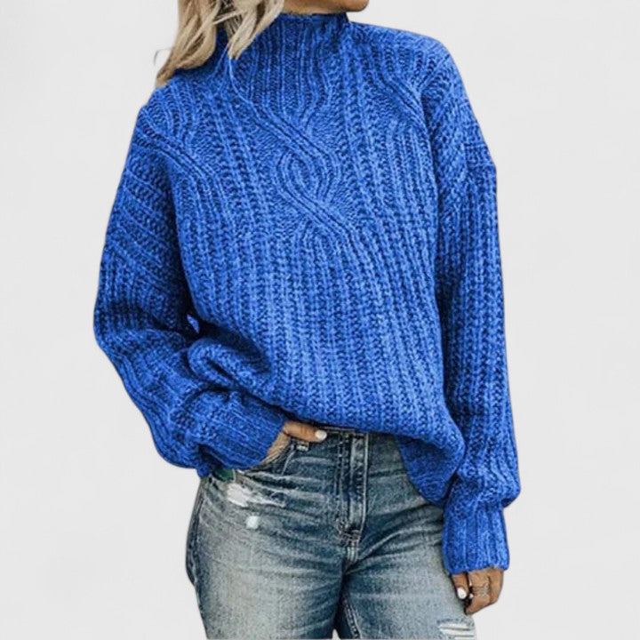 Pull torsadé vert Danoir Paris Lerynna, élégant, en tissu doux, porté sur un mannequin.