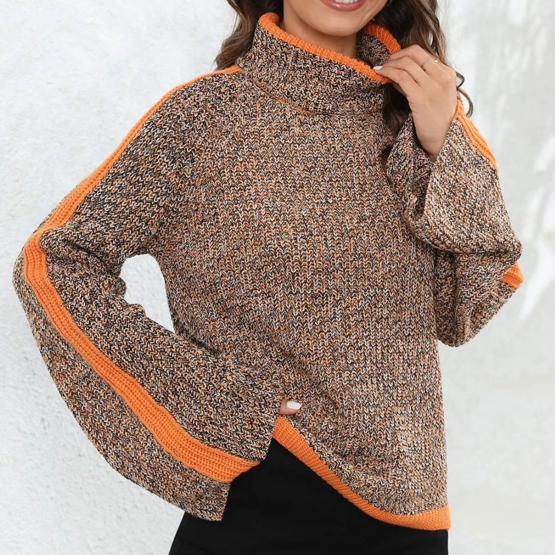 Pull patchwork chic Danoir Paris Diana, orange, en maille douce, porté sur mannequin, style tendance et moderne.
