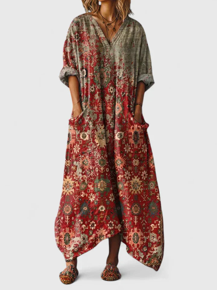 Robe élégante polyvalente orange Thalyssira de Danoir Paris, coupe fluide et style sophistiqué, parfait pour diverses occasions.