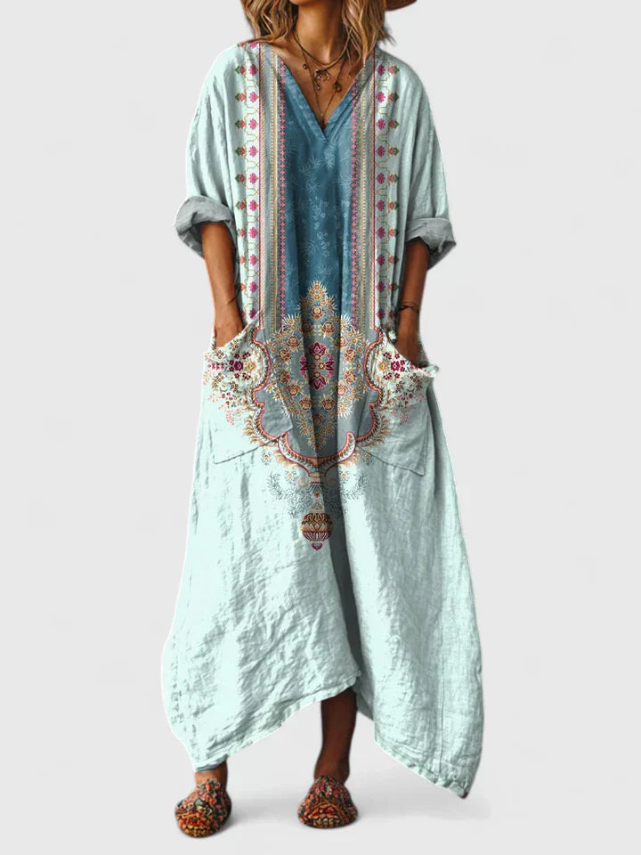 Robe élégante orange Danoir Paris Thalyssira, polyvalente, en tissu fluide, portée en soirée ou au quotidien, vue de face.
