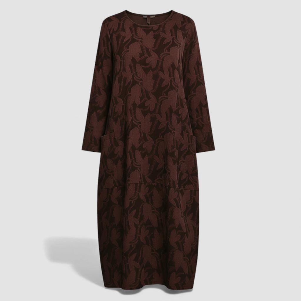 Robe aérée élégante Danoir Paris Elvane en tissu vert léger, détails sophistiqués et coupe fluide pour une allure chic et confortable.
