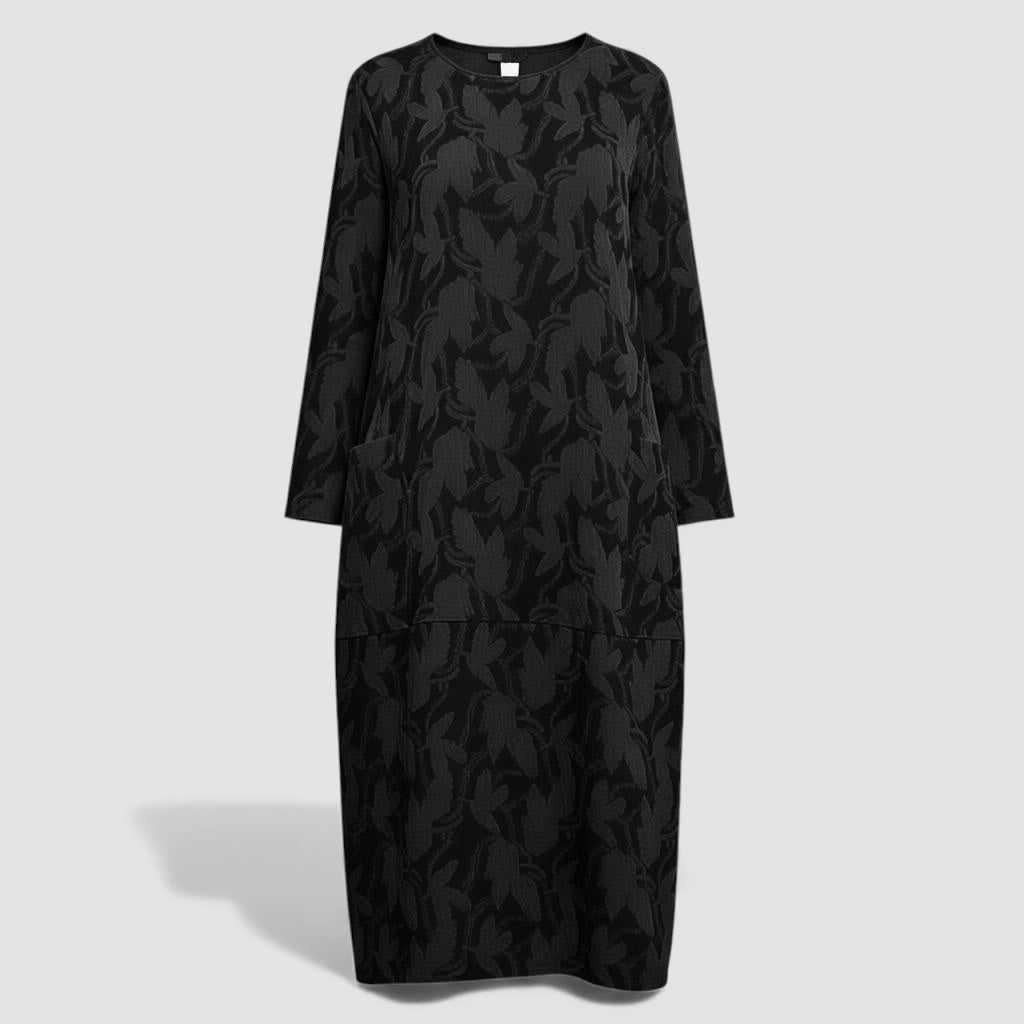 Robe aérée élégante Danoir Paris Elvane en tissu vert, coupe fluide et sophistiquée, parfaite pour une tenue chic.