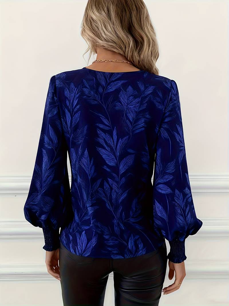 Blouse élégante Ruchama à imprimé feuilles verte de Danoir Paris, tissu léger et style sophistiqué.