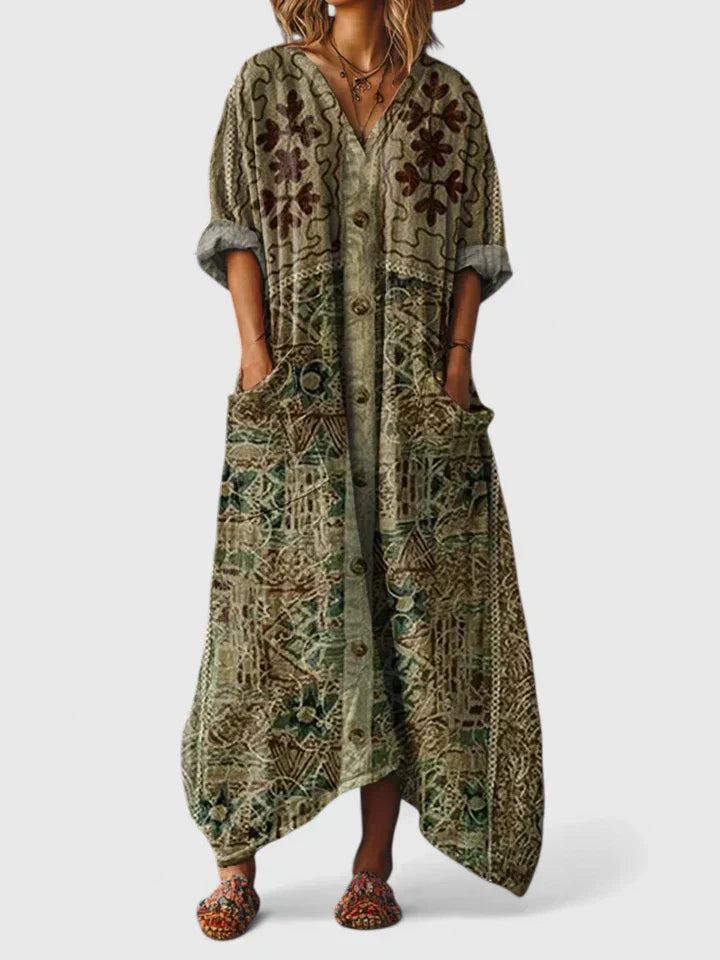 Robe élégante et polyvalente Thalyssira de Danoir Paris en orange, vue de face, tissu fluide et coupe sophistiquée.