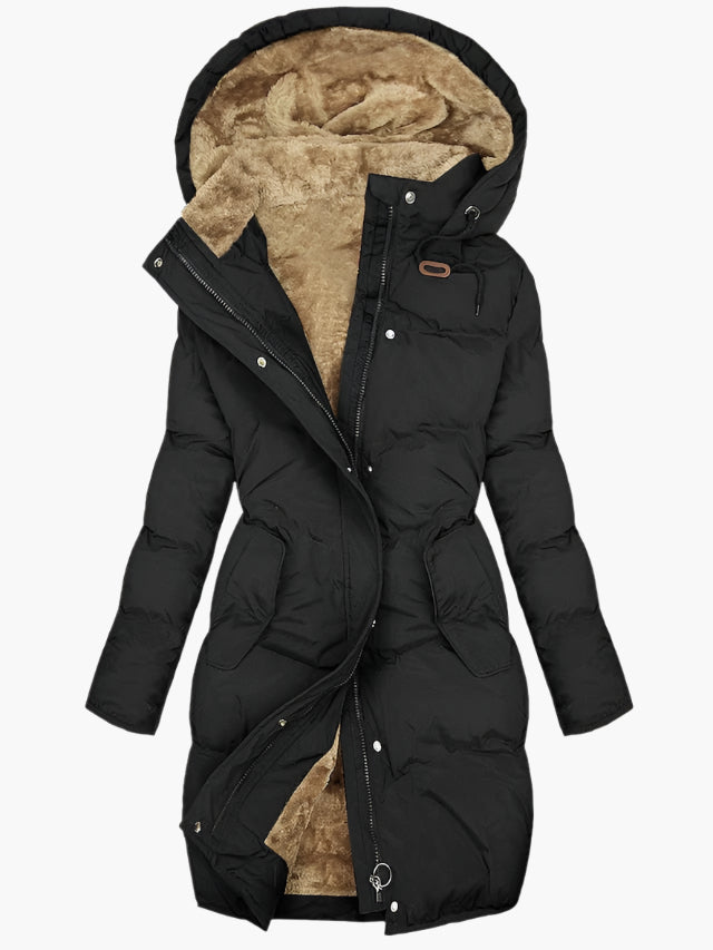 Manteau hivernal élégant Olivia de Danoir Paris en vert, coupe sophistiquée et chaud, pour femmes.