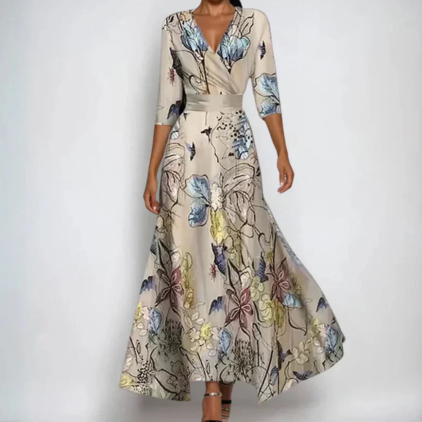 Robe florale de luxe Emily de Danoir Paris en blanc et bleu, détail de la robe élégante et raffinée.