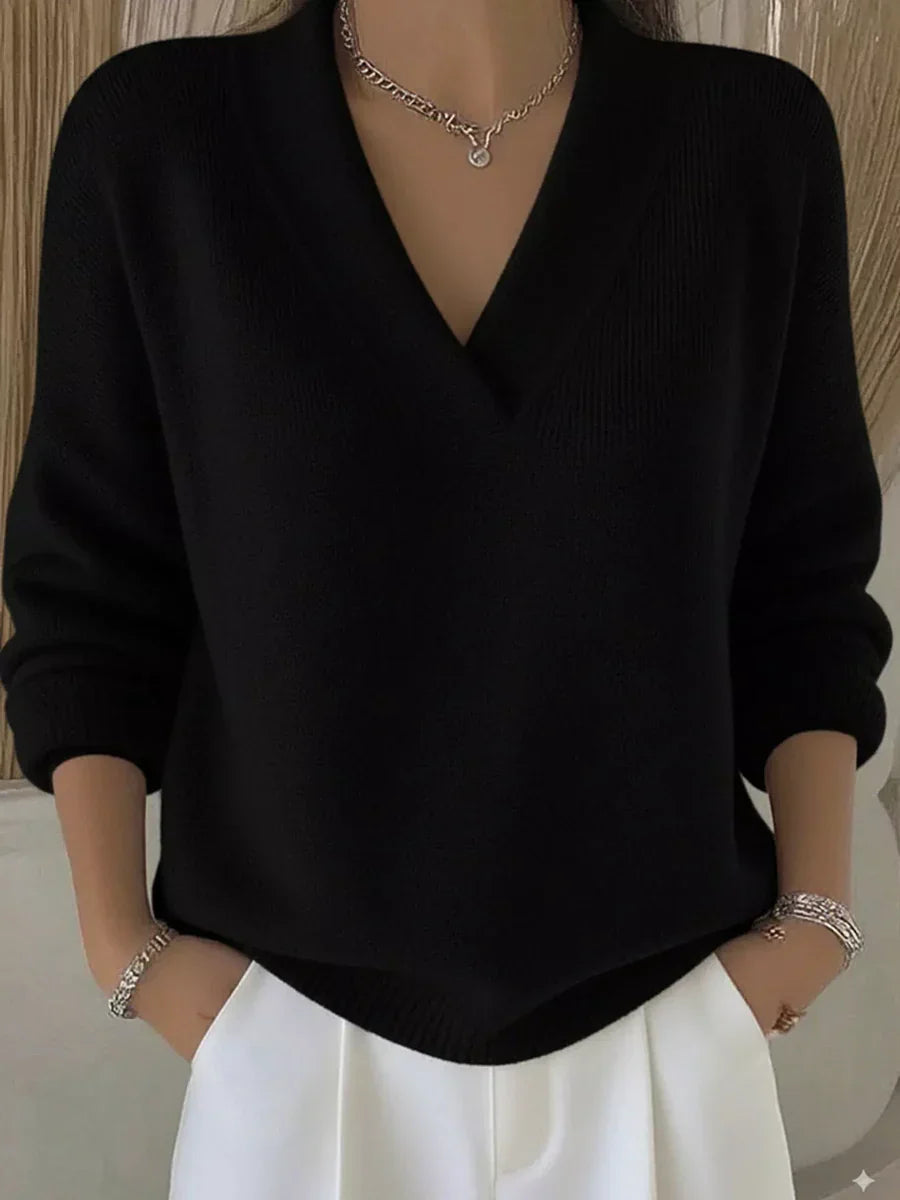Pull V-neck élégant Faye de Danoir Paris en rouge, coupe ajustée et style sophistiqué, visible en image.