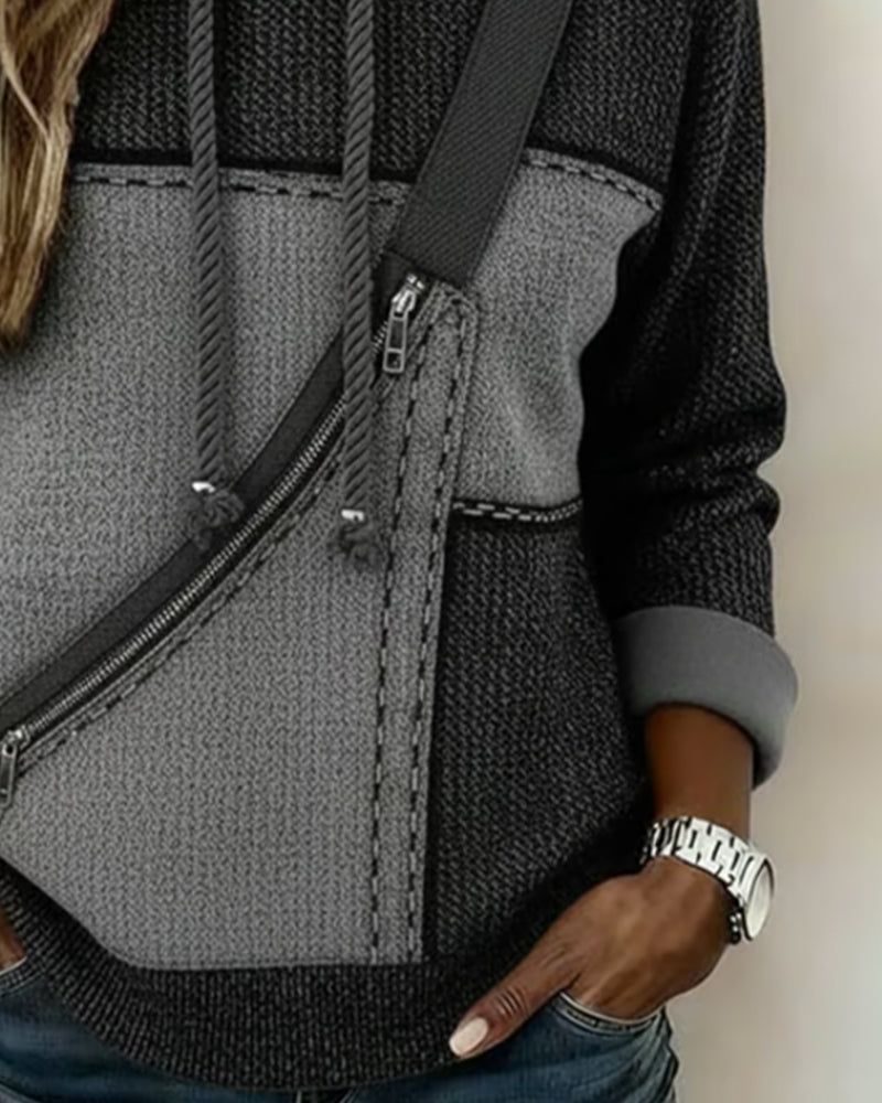Sweat à capuche color-block urbain Rosita de Danoir Paris, gris foncé, avec design moderne et détails tendance.