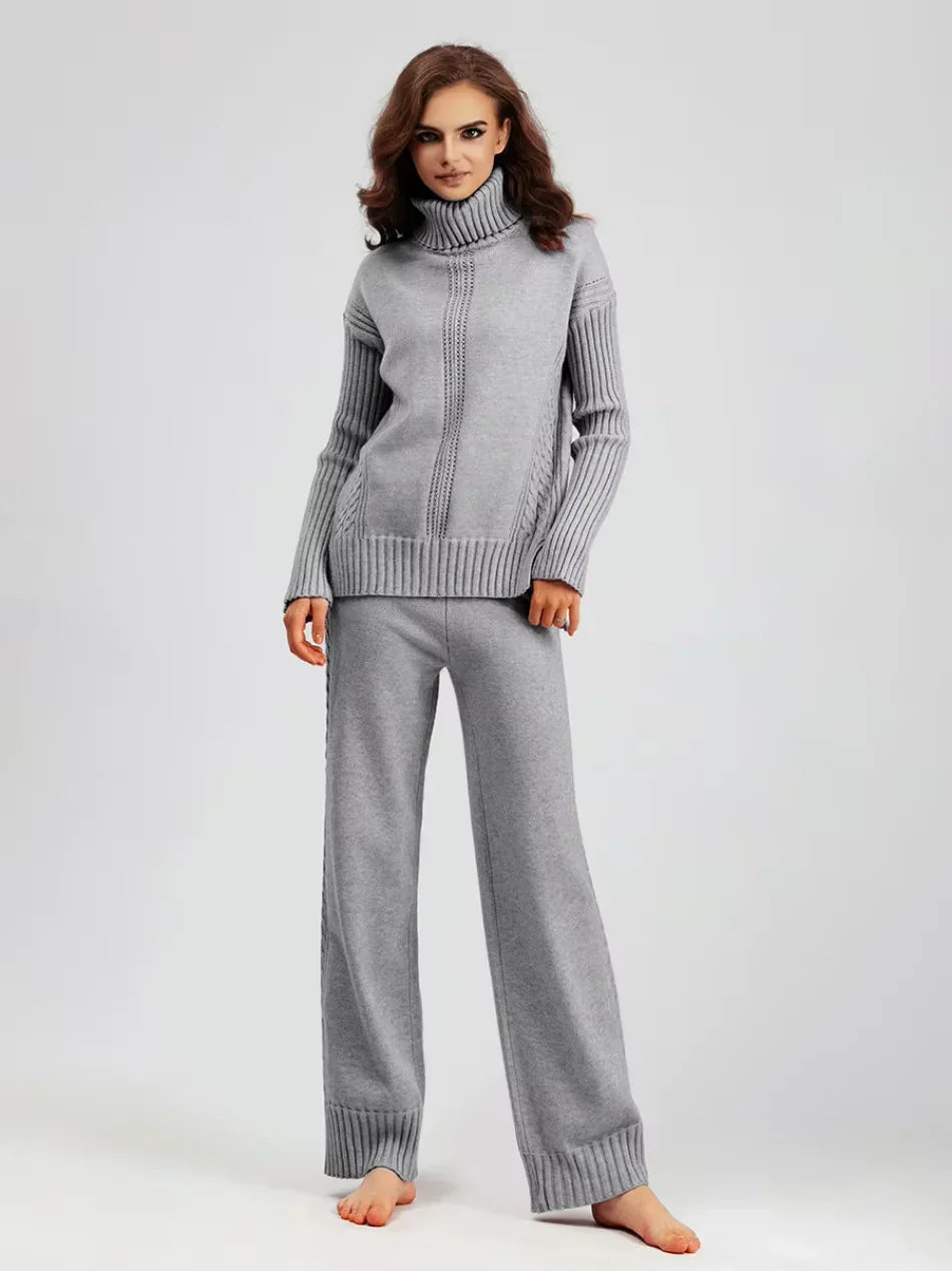 Ensemble tricoté chic Vianna de Danoir Paris en rose, veste et pantalon élégants, porté par un mannequin.