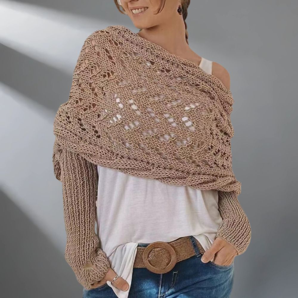 Châle tissé WarmWrap™ de Danoir Paris en vert grisâtre, élégant et chaud, porté enroulé autour du cou.