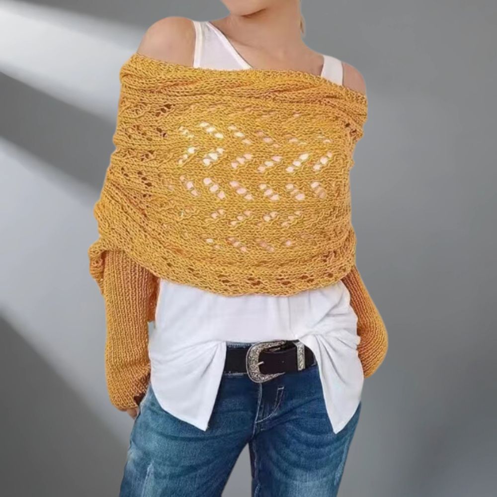 Châle tissé WarmWrap™ de Danoir Paris, élégant vert grisâtre, porté en style sophistiqué pour femme.