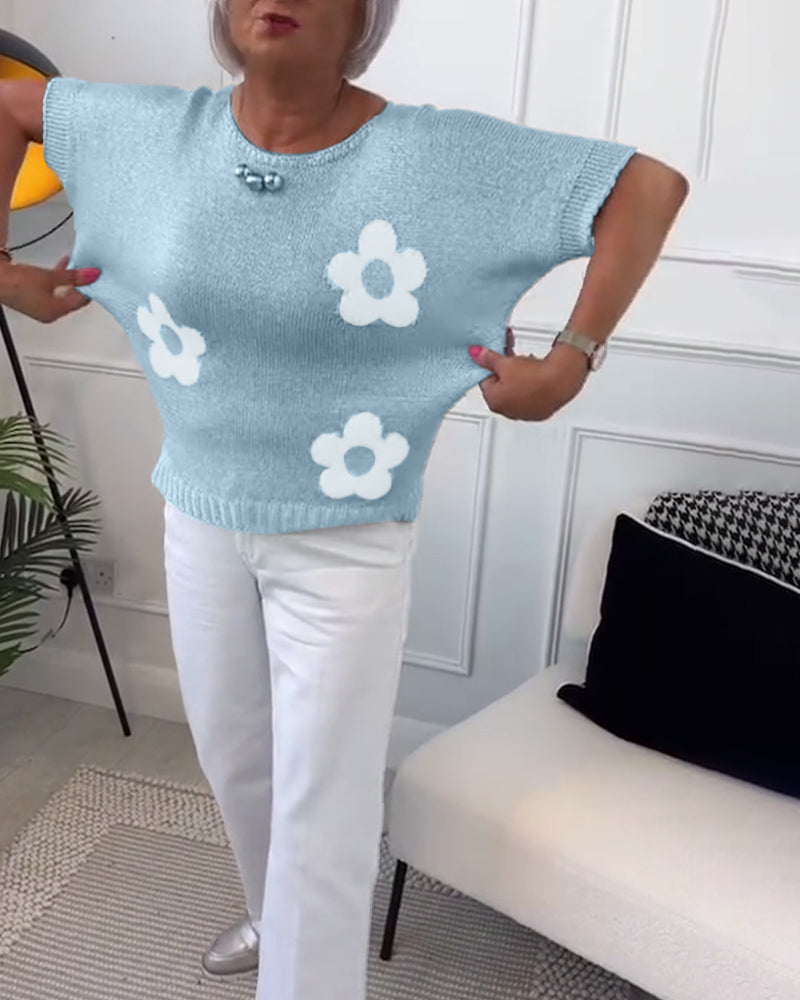 Pull gris Danoir Paris Daisy, élégant avec motif floral, pour femme, détail de la texture en tissu.