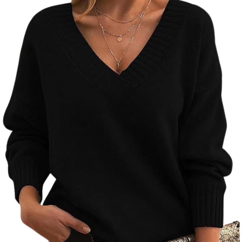 Pull élégant en mélange de cachemire Lenia de Danoir Paris, couleur abricot, porté avec col ras du cou et manches longues.