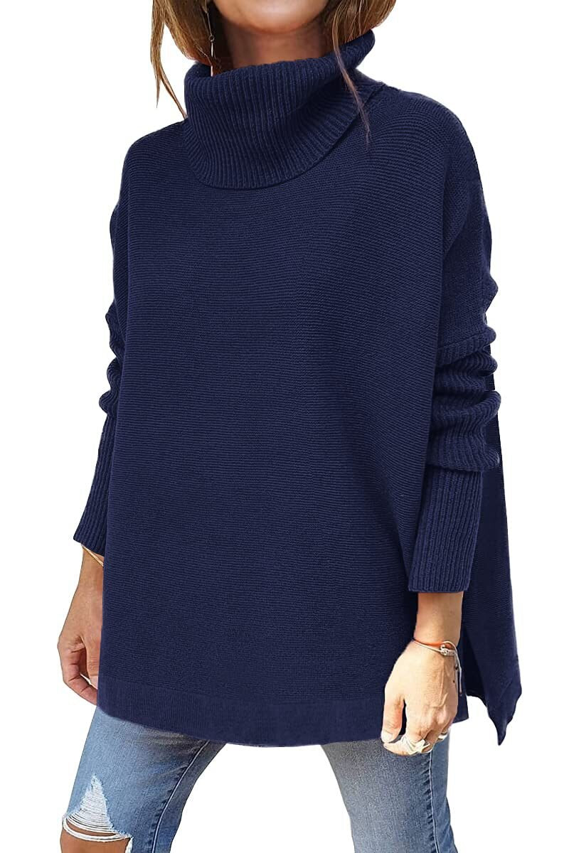 Pull beige Danoir Paris Neryssa, chic et douillet, en laine douce, porté sur un mannequin dans une ambiance élégante.