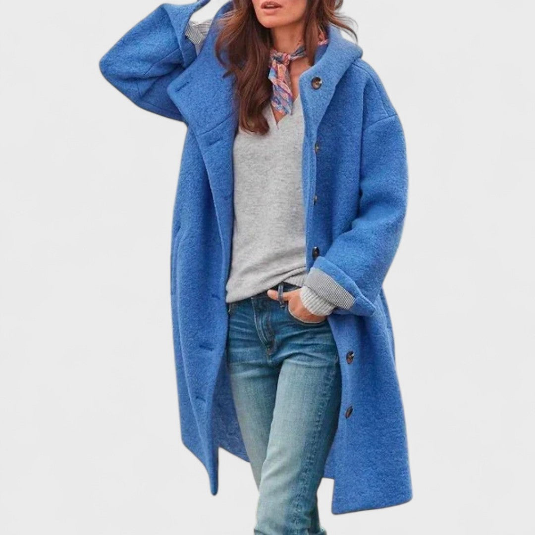 Veste en laine douillette Olivia de Danoir Paris, couleur vert foncé, style élégant et chaud pour l'hiver.