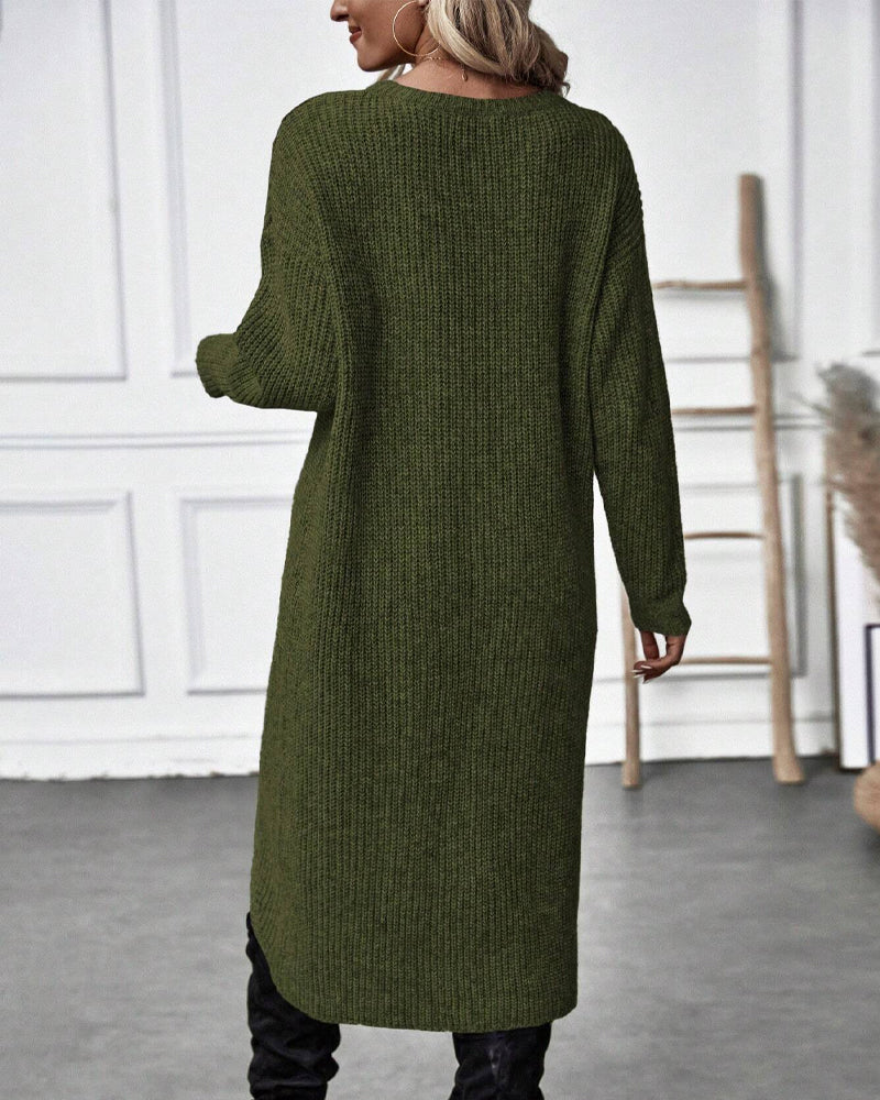 Pull long élégant Brigit de Danoir Paris, en gris, avec coupe fluide et style sophistiqué, porté sur un mannequin.