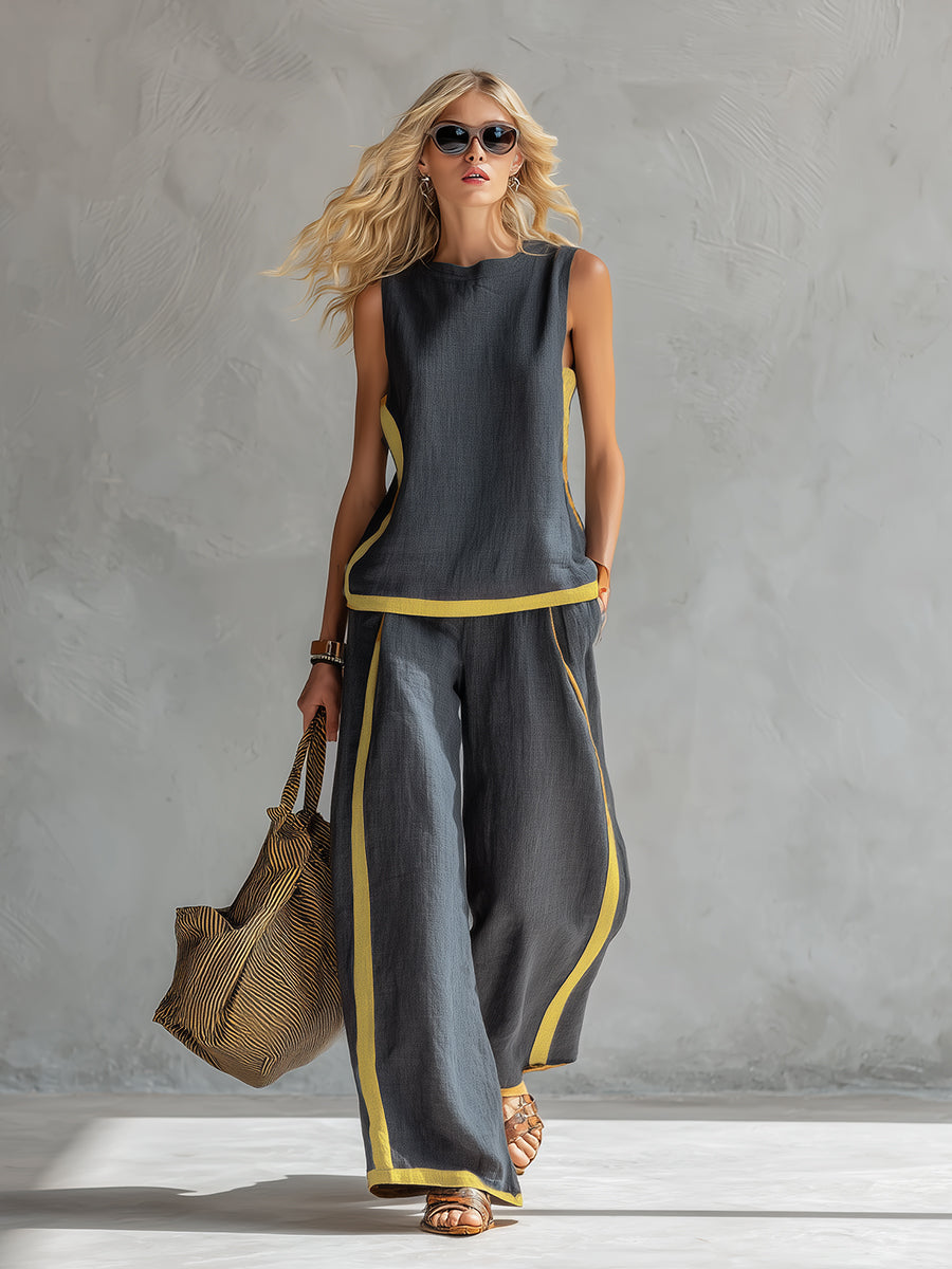 Ensemble deux pièces élégant gris Leila de Danoir Paris, avec hauts et pantalons assortis, porté par un mannequin.